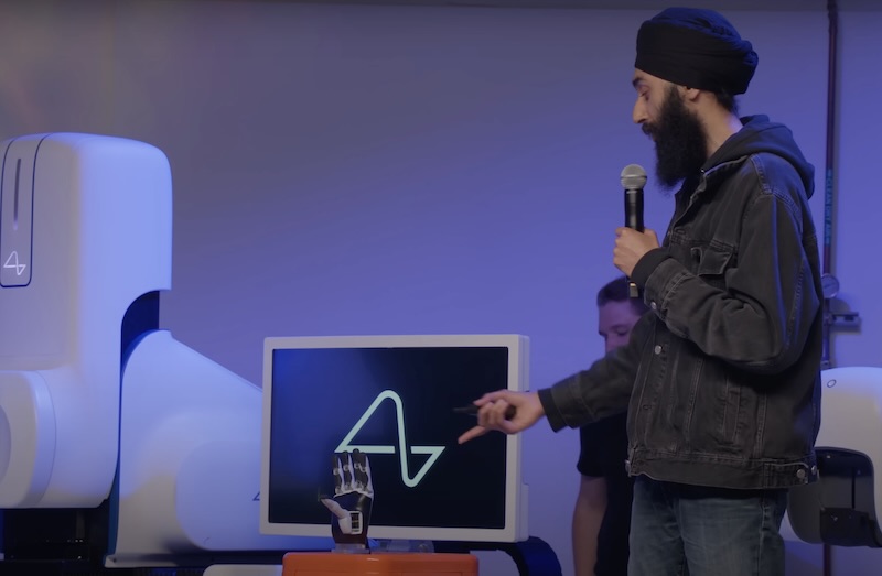 A Tesla Optimus Hand responded to Alex's neural signals